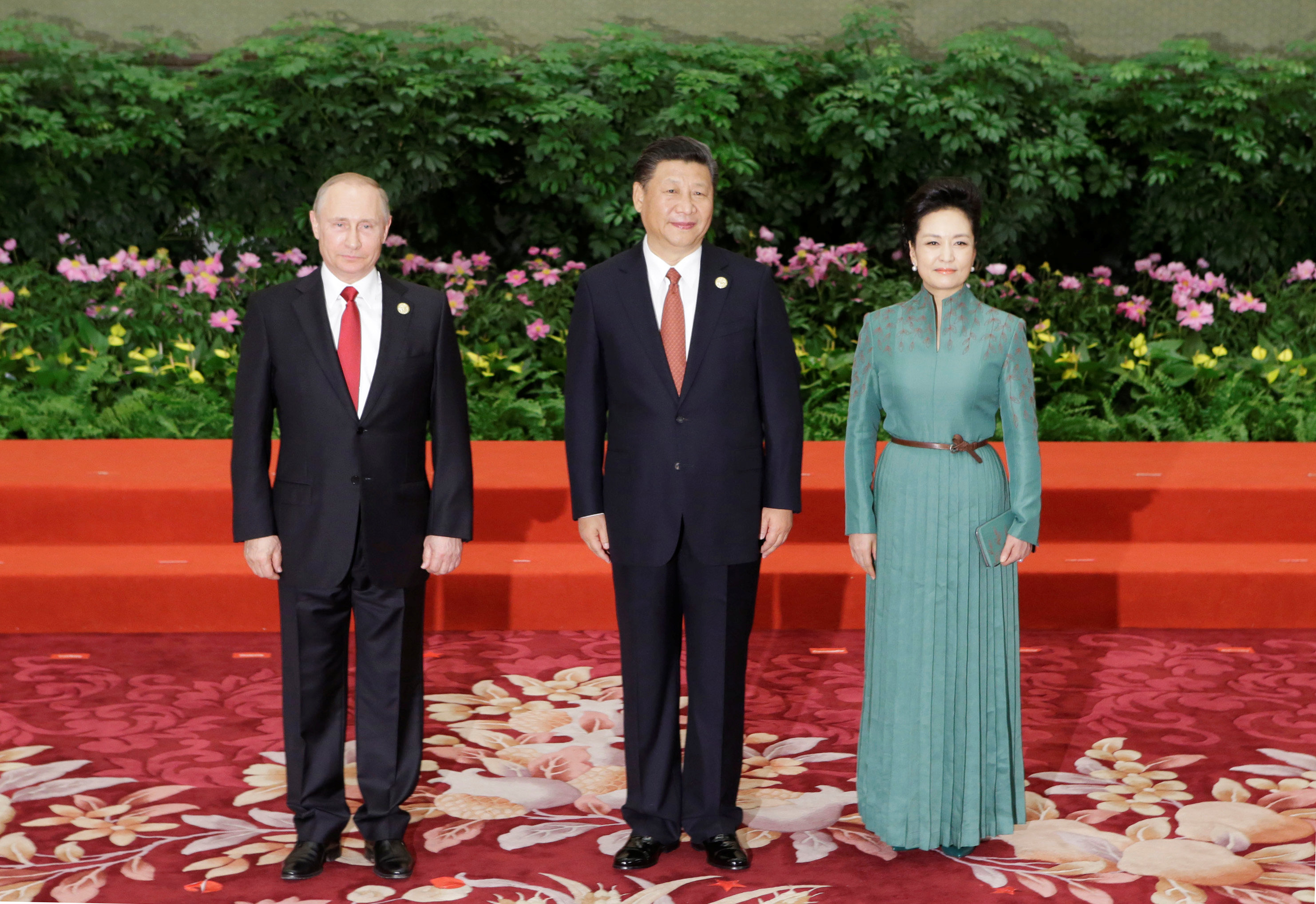 الرئيس الروسى ونظيره الصينى وزوجته