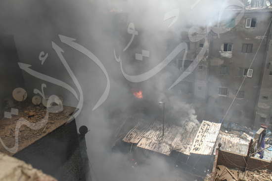 حريق بسوق الملابس في إمبابة (7)