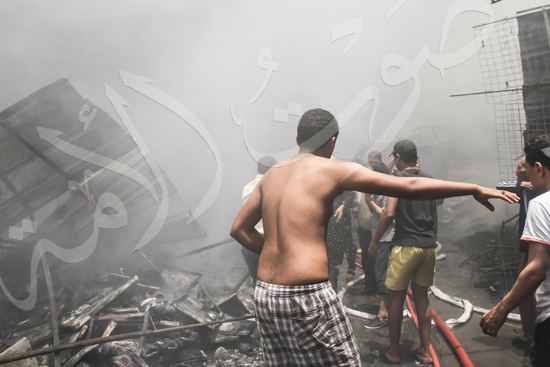 حريق بسوق الملابس في إمبابة (10)