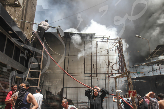 حريق بسوق الملابس في إمبابة (5)