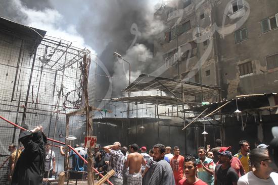 حريق بسوق الملابس في إمبابة (6)