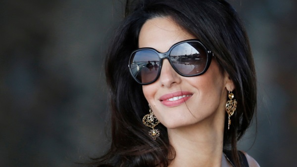 بروفايل أمل كلونى.. «أول ما تشطح تنطح»  