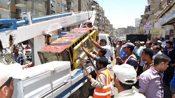 حملة مرافق بالجيزة لرفع الإشغالات من الطريق العام حملة مرافق بالجيزة لرفع الإشغالات من الطريق العام