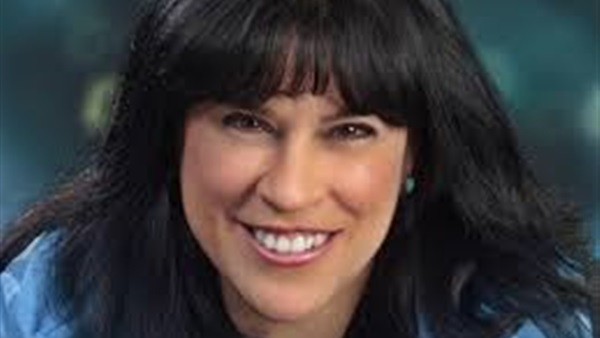 بالصور..امراه امريكيه تدخل  موسوعه غينيس بسبب "الثرثره"