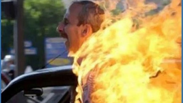 موظف يُشعل النار بسيارة ميكانيكى لخلافات سابقة بالجيزة 