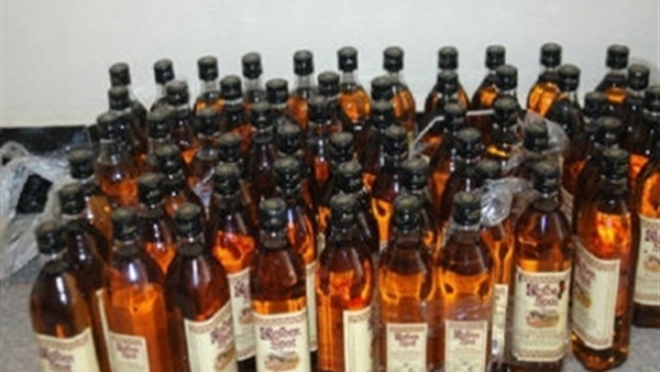 ضبط 4426 زجاجة خمور داخل محل شهير بدون ترخيص بالاسكندرية 