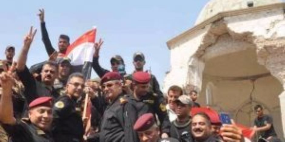 العلم العراقي يرفرف على مسجد النوري بالموصل (فيديو) العلم العراقي يرفرف على مسجد النوري بالموصل (فيديو)