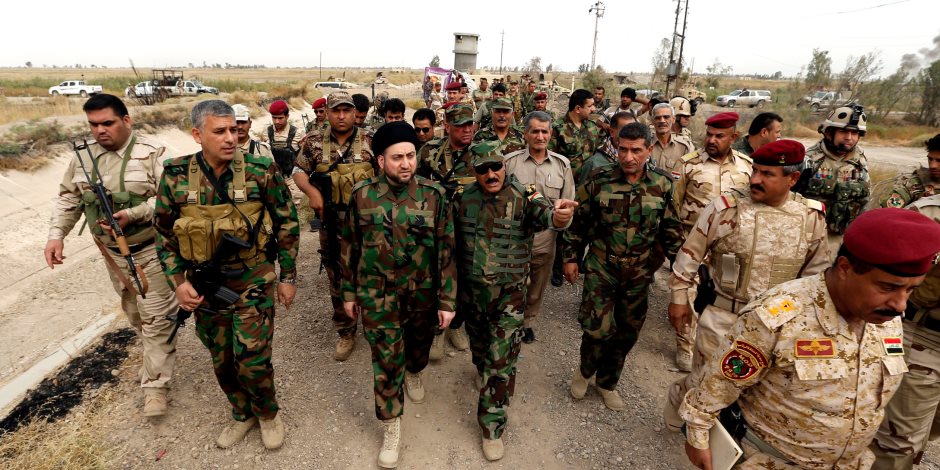 اندلاع اشتباكات عنيفة بين تنظيم داعش الإرهابي و"الحشد الشعبي" قرب الحدود السورية العراقية