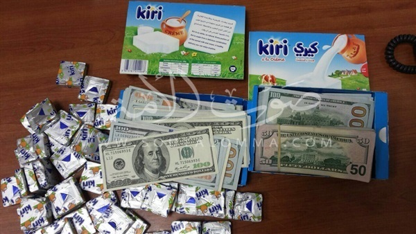 ضبط راكبين بالمطار حاولا تهريب 40 ألف دولار داخل علب جبنة ضبط راكبين بالمطار حاولا تهريب 40 ألف دولار داخل علب جبنة