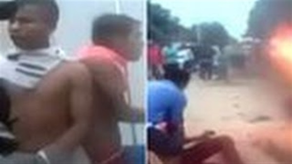 بالفيديو.. حشد غاضب يحاول حرق لصين بالفيديو.. حشد غاضب يحاول حرق لصين