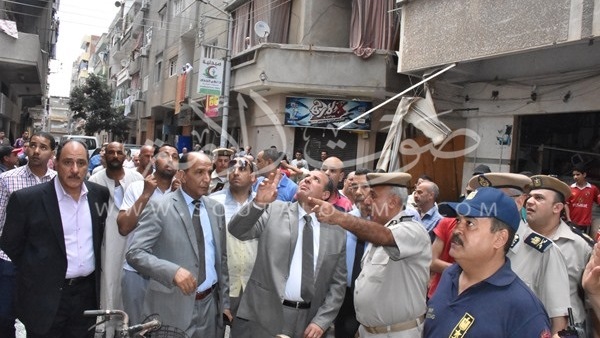 بالصور.. آثار «انفجار البحيرة» وتهشم 20 محلا بالصور.. آثار «انفجار البحيرة» وتهشم 20 محلا