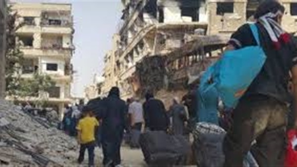 بدء خروج المقاتلين وعائلاتهم من مدينة داريا المحاصرة