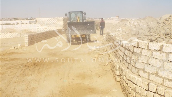 إزالة التعديات على شارع «خليفة» بالواحات البحرية (صور) إزالة التعديات على شارع «خليفة» بالواحات البحرية (صور)