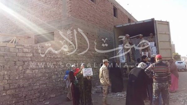 القوات المسلحة توزع 4 آلف كرتونة سلع غذائية بـ«الخانكة» (صور) القوات المسلحة توزع 4 آلف كرتونة سلع غذائية بـ«الخانكة» (صور)