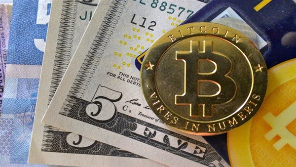 عملة «بيتكوين» تهدد عرش الدولار عملة «بيتكوين» تهدد عرش الدولار