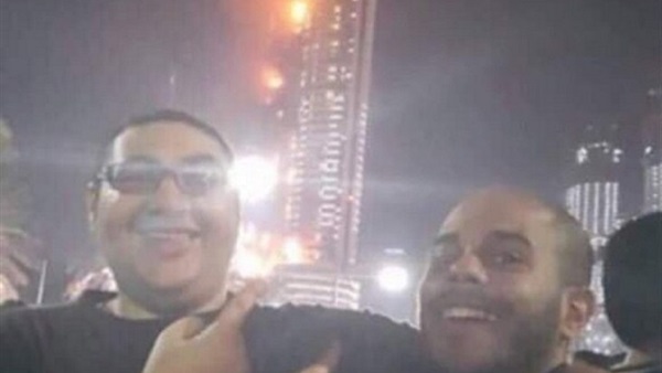 الإفراج عن مصريين التقطا سيلفي مع حريق فندق دبي الإفراج عن مصريين التقطا سيلفي مع حريق فندق دبي