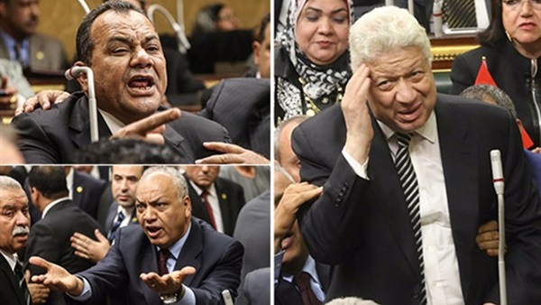 خناقات تحت قبة البرلمان..«مرتضى منصور» يثير حالة من الهرج ويتسبب فى رفع الجلسة..شوبير: لبرلمانى إخوانى «أنا وطني وأشرف منك، وحياة أمك مش هسيبك»..ووزير الداخلية يصفع نائب على وجهه خناقات تحت قبة البرلمان..«مرتضى منصور» يثير حالة من الهرج ويتسبب فى رفع الجلسة..شوبير: لبرلمانى إخوانى «أنا وطني وأشرف منك، وحياة أمك مش هسيبك»..ووزير الداخلية يصفع نائب على وجهه