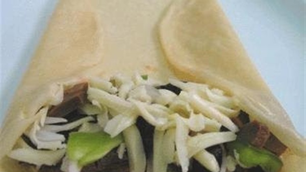 خطوات تحضير رولات البيتزا المحشية