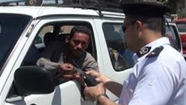 ضبط 2415 مخالفة متنوعة بحملة مروروية بالجيزة  