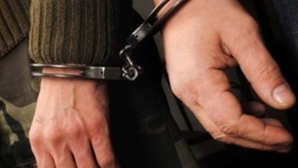 حجز أميني شرطة بنيابة الحدائق لاتهامهما بتهريب متهم