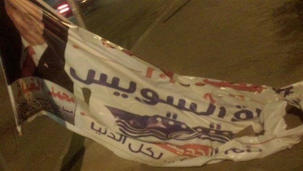 فى ثانى ايام الدعاية الانتخابية بالمنيا مجهول  يمزق للافتتات المرشحين  