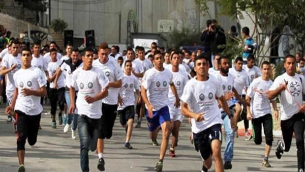 قيادات «فتح وحماس» تشارك في ماراثون رياضي بغزة