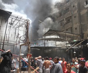 حريق هائل بسوق الملابس في إمبابة(صور)