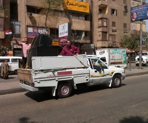 سيارات بمكبرات صوت تجوب شوارع الجيزة لحث المواطنين على المشاركة بالانتخابات (صور)