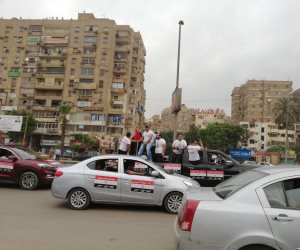مسيرة بالسيارات فى شارع جامعة الدول دعما للانتخابات الرئاسية (صور)