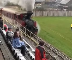 قطار يمر عبر الاستاد.. أغرب ملعب كرة قدم فى العالم (فيديو)