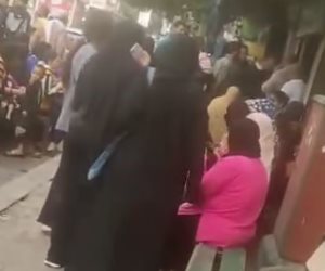 الداخلية تكشف تفاصيل توزيع رشاوى إنتخابية على الناخبين أمام جمعية خيرية فى المنيل 