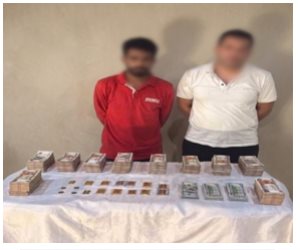 ضبط كرتونة تحتوى على أموال وذهب بحوزة عامل سرقها من مركز طبى لجراحات العيون بالقاهرة 