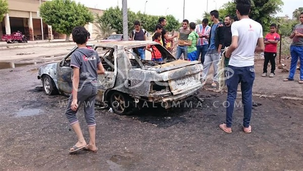 بالصور.. السيطرة على حريق فى  سيارة بالمحلة  