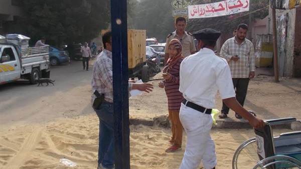 بالصور..«مقاعد متحركة» لكبار  السن في انتخابات العجوزة 