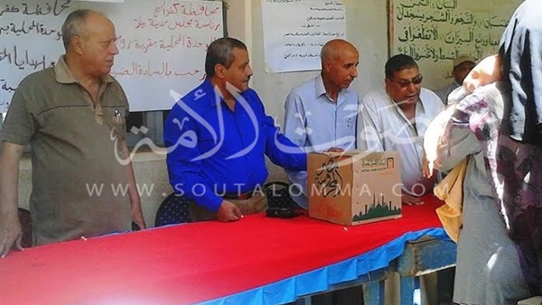 بالصور.. توزيع «كراتين» رمضان على فقراء بيلا فى كفر الشيخ