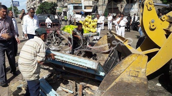  بالصور .. حملة للقضاء على الإشغالات بحي الزهور ببورسعيد 
