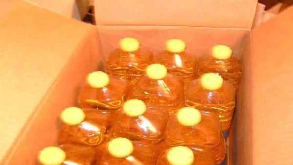 ضبط 2250 كرتونة زيت داخل جراج بالمقطم