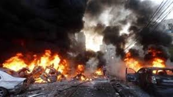 15 قتيلا ومصابا في انفجار سيارتين مفخختين بموقف للسيارات في بغداد