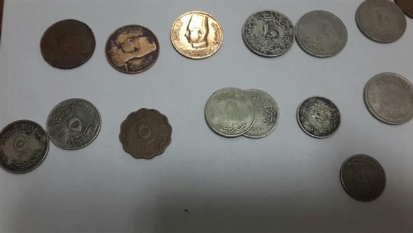 ضبط عملات أثرية تعود للعصرين اليوناني والروماني بمطار القاهرة