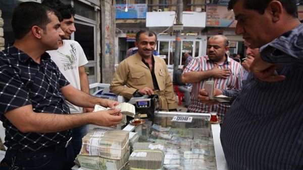 إغلاق 300 شركة صرافة بالعراق لتورطها في تمويل «داعش»