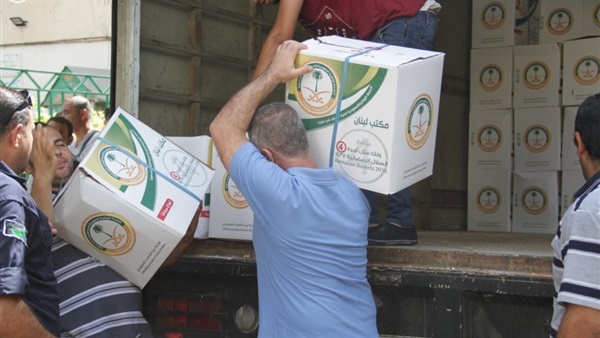 «الوطنية السعودية» توزع مساعداتها الإغاثية على اللاجئين السوريين بلبنان
